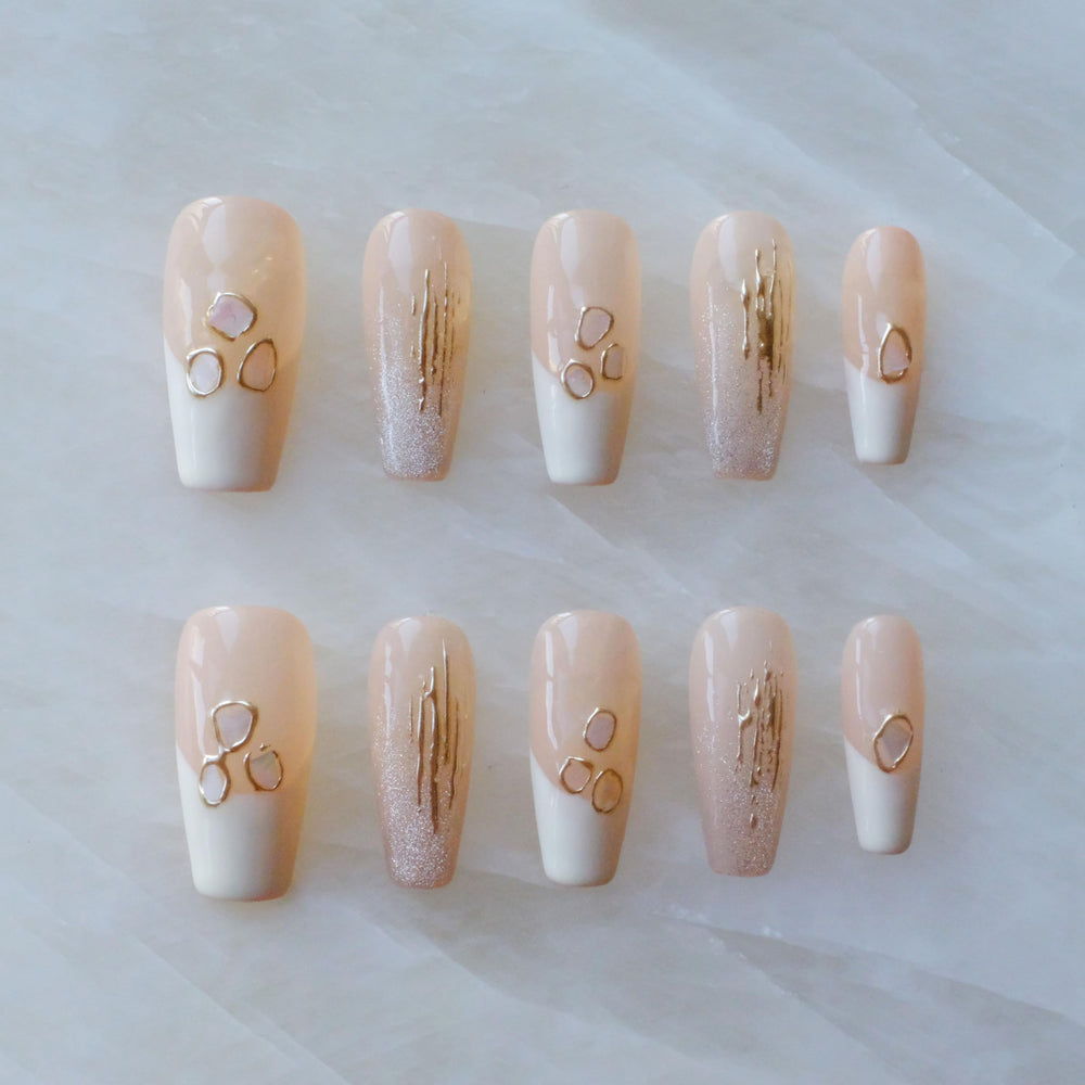 GLORS nails with pink-white gradient and shell accents for an elegant, salon-ready at-home wear