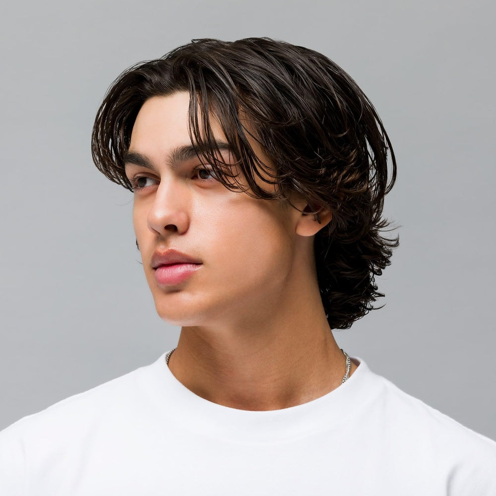 JOHNNY B. Conditional Conditioner on shelf suggesting thicker-looking hair after use.
