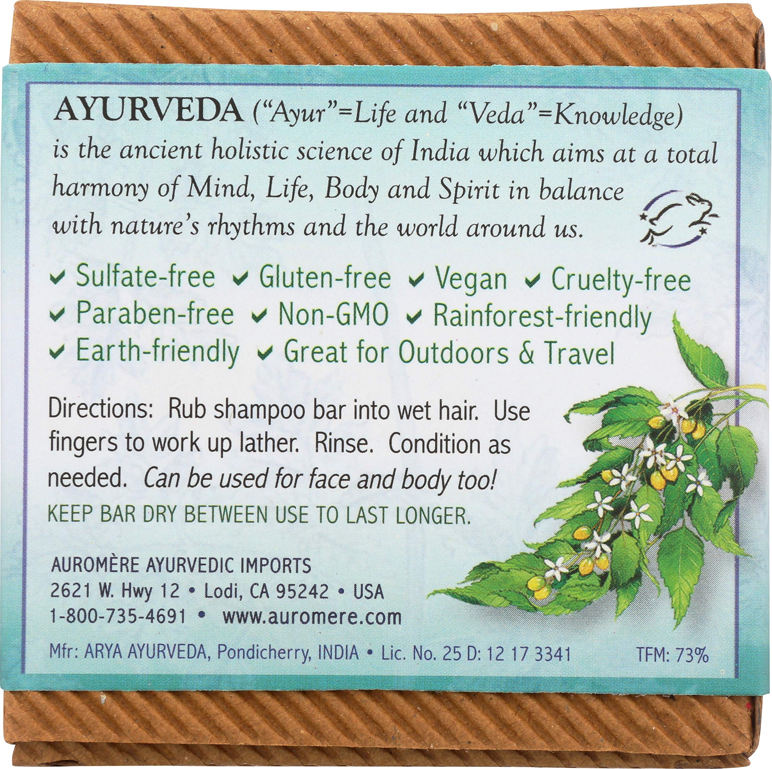 Auromere Shampoo Bar lathering in hand for quick cleansing.