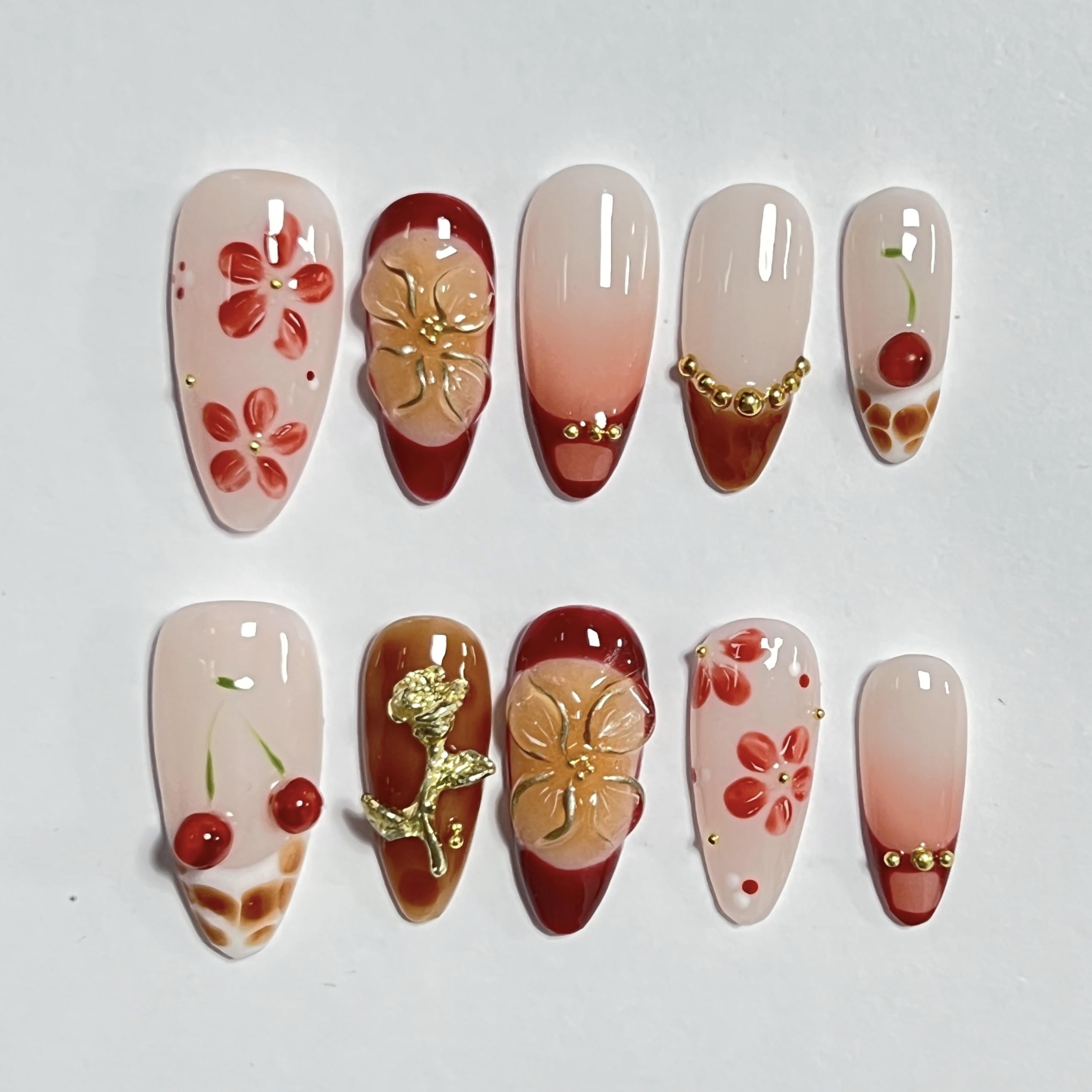 CTTHNBD almond nails full-cover with 3D gold flower detail for elegance