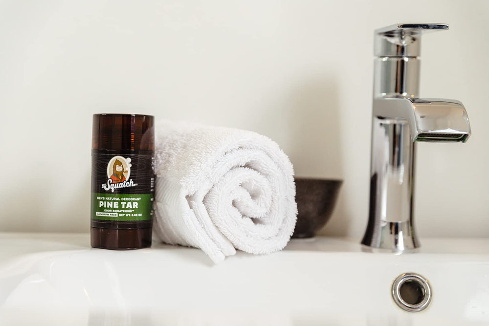 Men’s grooming scene with natural deodorant by Dr. Squatch.