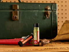 Car, bag, and desk-ready lip balm for everyday use by Duke Cannon Balm 140°.