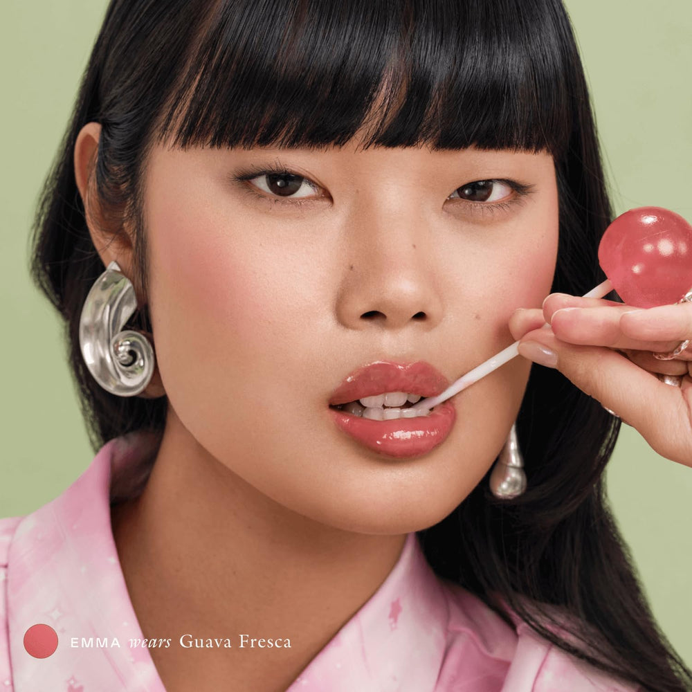 Applying EADEM Le Chouchou lip balm for overnight hydration.