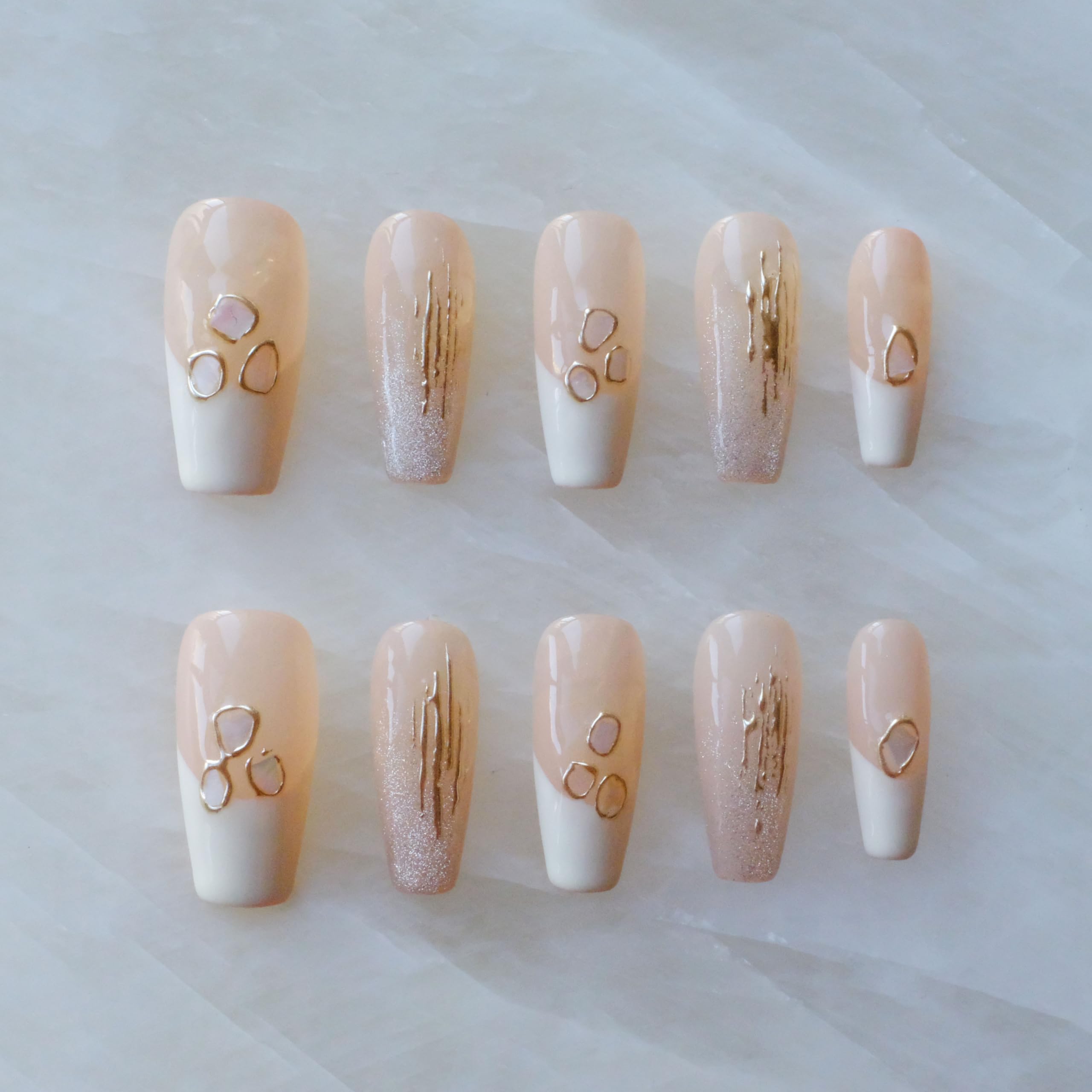 GLORS nails with pink-white gradient and shell accents for an elegant, salon-ready at-home wear