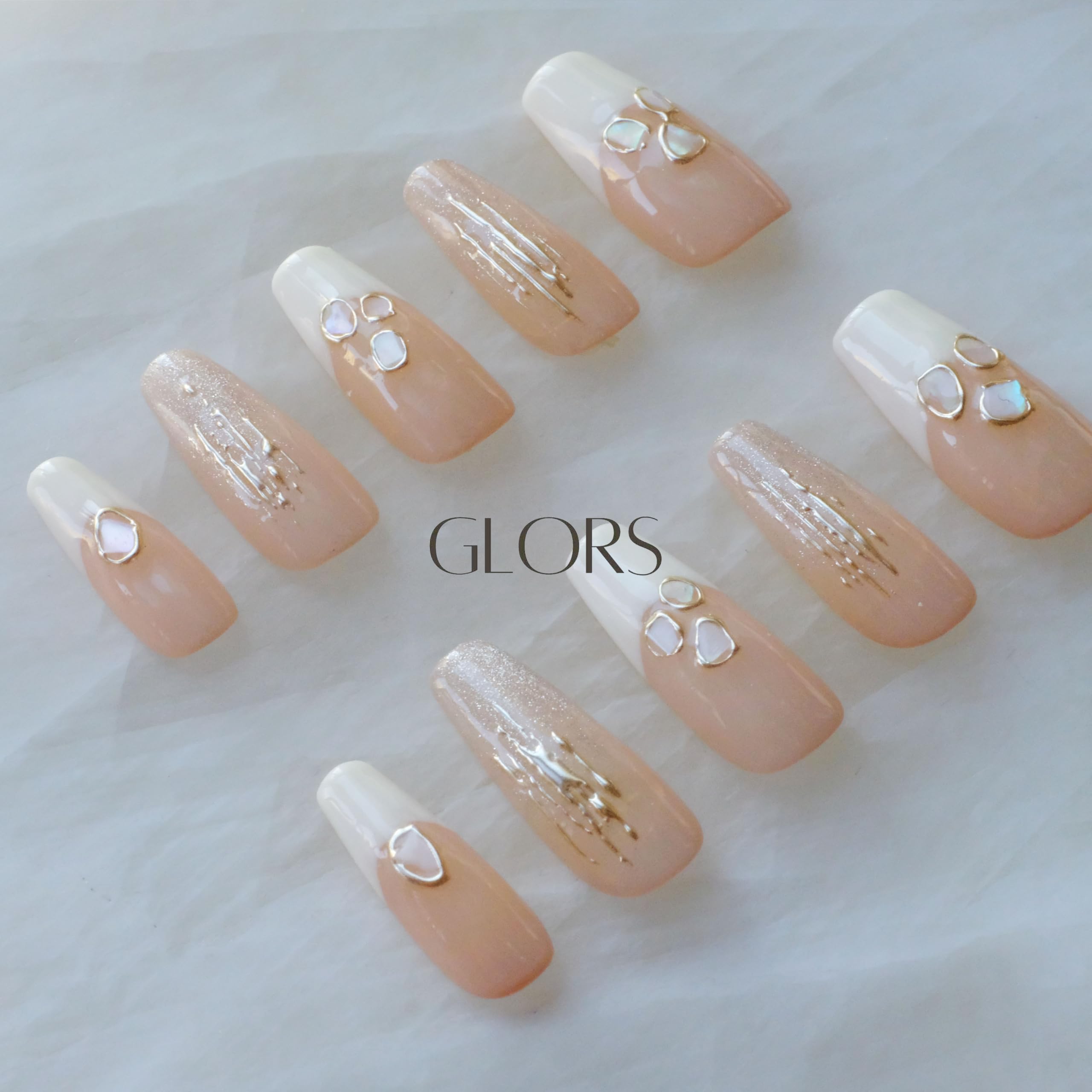 Shell embellishments catch light for a subtle, premium look