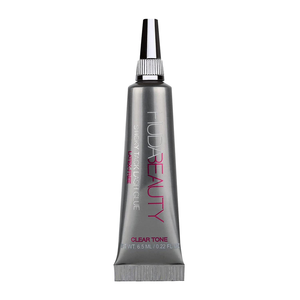 HUDA Beauty Sticky Tack Lash Glue brush illustrates precise, easy application.