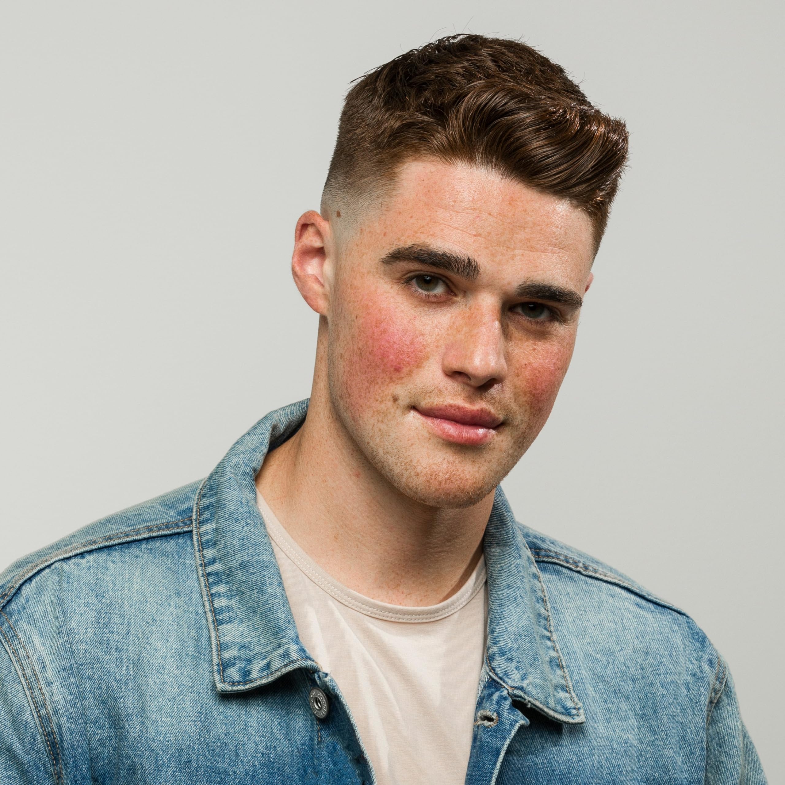 JOHNNY B. Control shown for all hair types with versatile styling options.