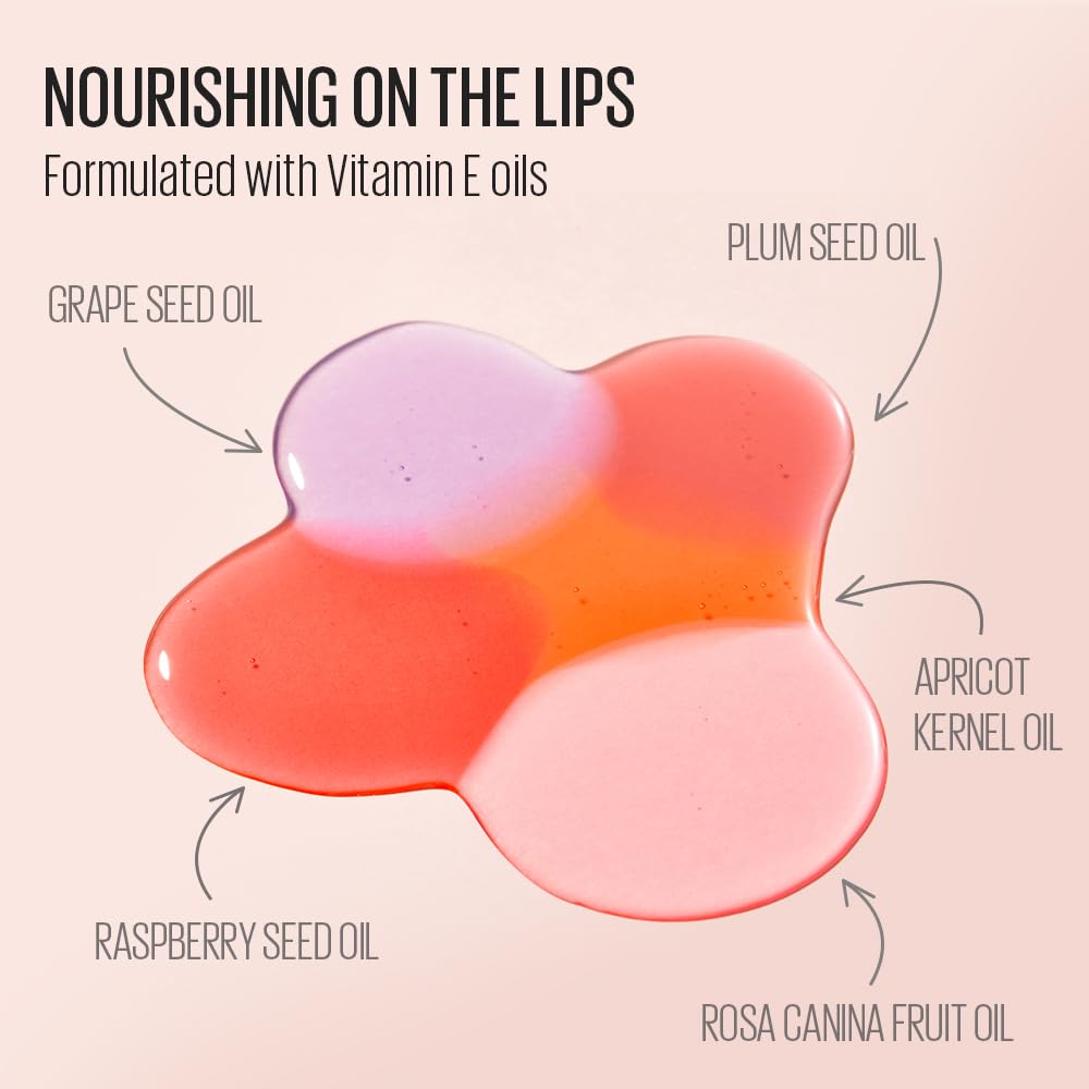 Kaja lip oil cap with heart stone and stylish label detail