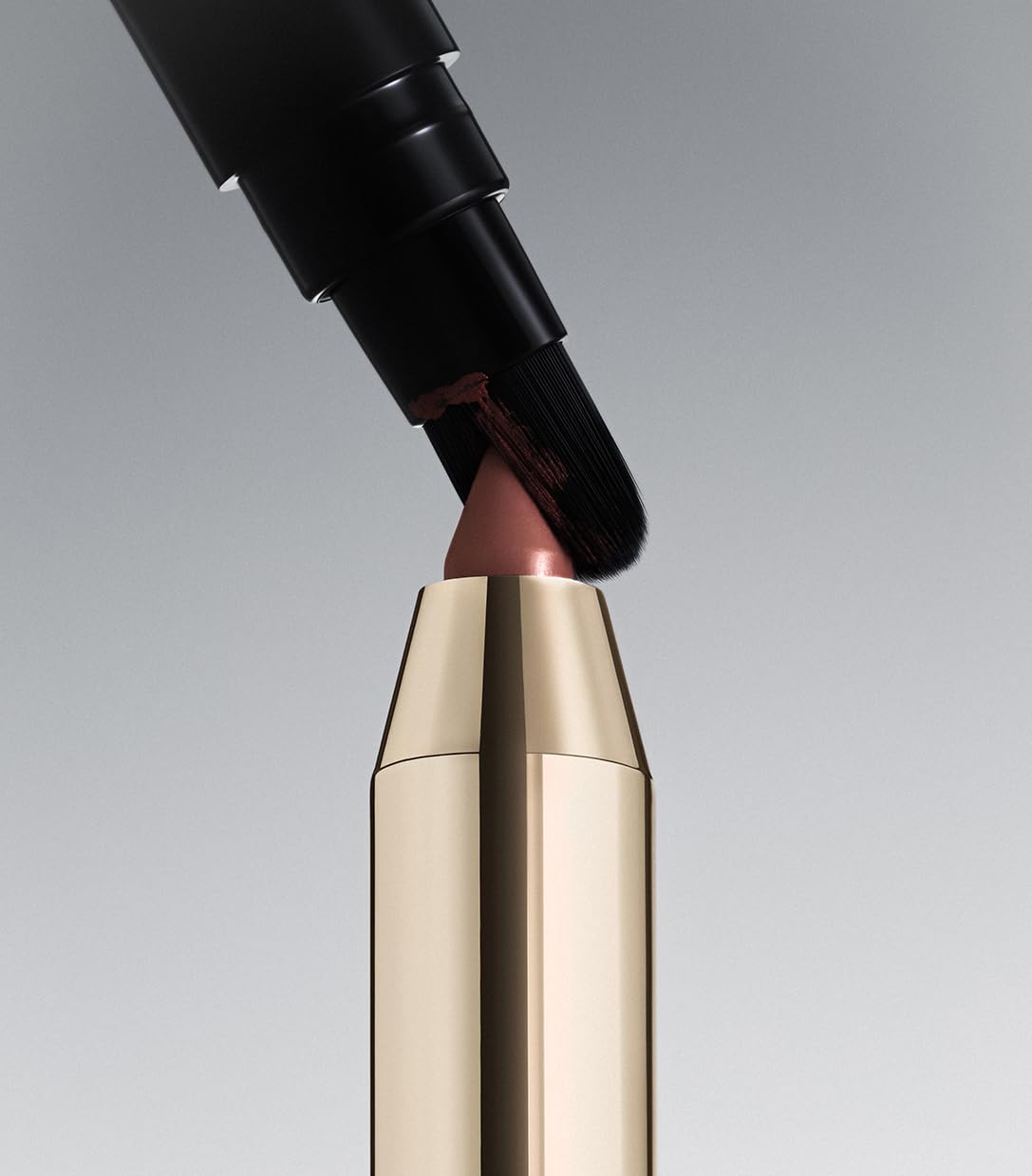 Make Beauty Continuum Lip Liner Elemental non-drying formula glides over lips.