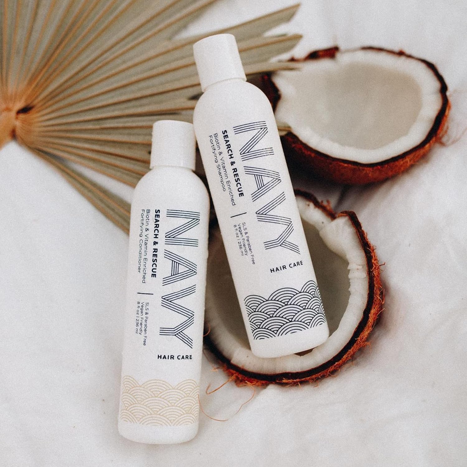 NAVY HAIR CARE Search and Rescue shampoo ingredient panel with biotin and rosemary for nourishing care.