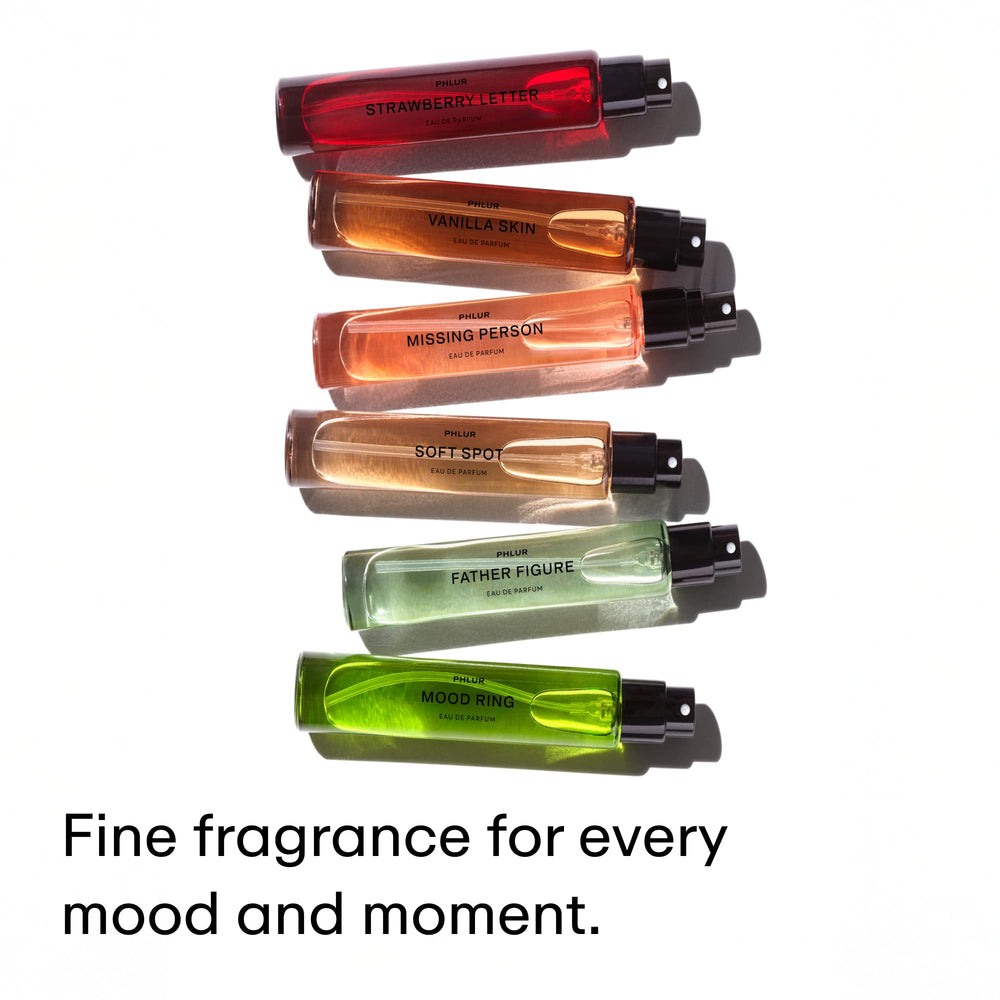 PHLUR bottle label hints at ingredient transparency and craftsmanship.