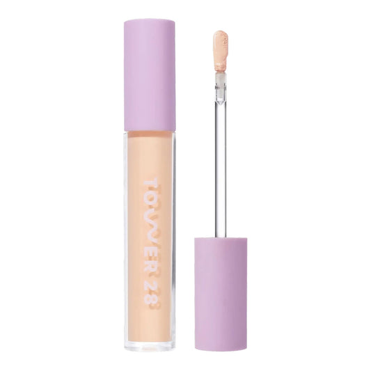 Tower 28 Swipe Serum Concealer tube applying smooth, hydrating coverage for dark circles